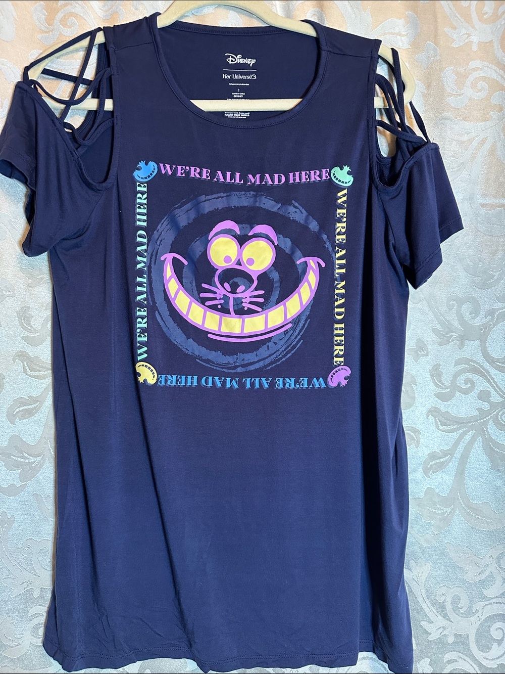 Disney Navy Cold-Shoulder Cheshire Cat Graphic Tee with Purple & Yellow Accents